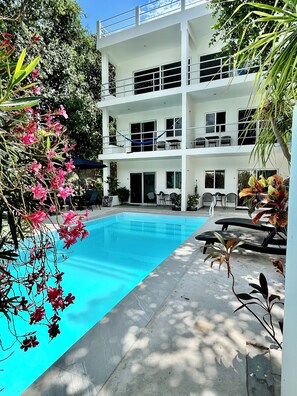 Outdoor pool - AQUA GUESTHOUSE 1~ STEPS FROM BEACH ~ A+ INTERNET (Puerto Morelos)