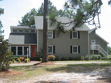 Beautiful Remodeled  Home on the Canal with circle drive and 2 car garage