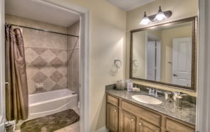 Combined shower/tub, hair dryer, towels, soap