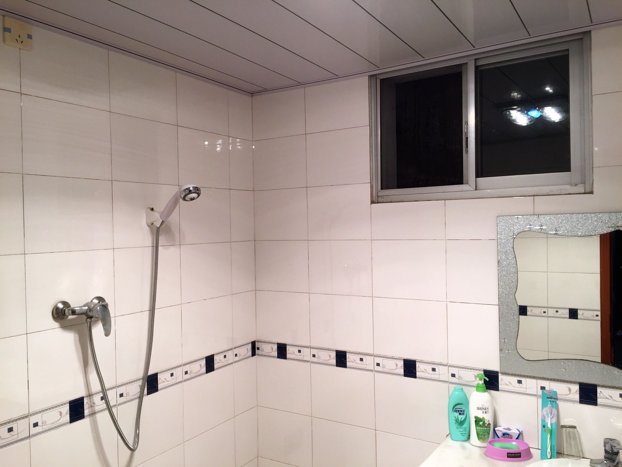 Shower, free toiletries, hair dryer, slippers