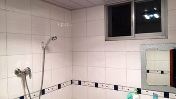 Shower, free toiletries, hair dryer, slippers