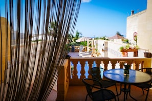 Outdoor pool, open 9:00 AM to 9:00 PM, pool umbrellas, pool loungers