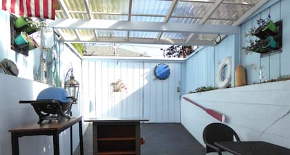 PORTHOLE: Peaceful with a private, locked, covered patio to relax/ store bikes.