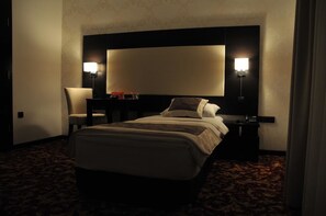 Premium bedding, blackout drapes, soundproofing, free cribs/infant beds