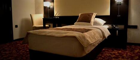 Premium bedding, blackout drapes, soundproofing, free cribs/infant beds