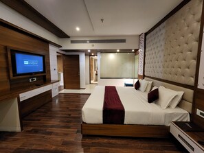 Deluxe Room, 1 King Bed | Premium bedding, in-room safe, desk, laptop workspace - Hotel Preethi International (Mysore)
