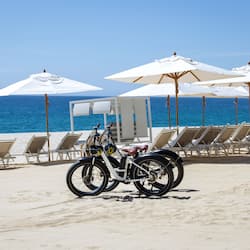 On the beach, sun loungers, beach umbrellas, beach towels