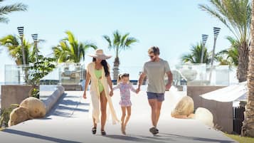 On the beach, sun loungers, beach umbrellas, beach towels