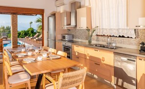 Villa, 3 Bedrooms, Private Pool, Sea View | Private kitchen | Full-size fridge, microwave, oven, stovetop - Iris Villas Lefkada - Karavi Villa (Lefkada)
