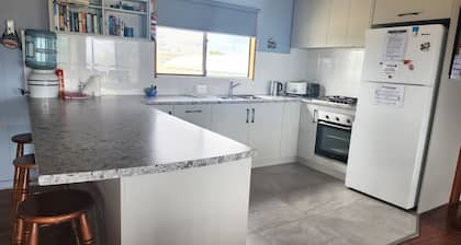 What do you want from a holiday home. Short walk to the beach, shops, cafes and pubs?