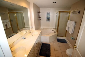Combined shower/tub, jetted tub, hair dryer, towels