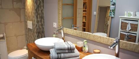 Combined shower/tub, hair dryer, towels, soap