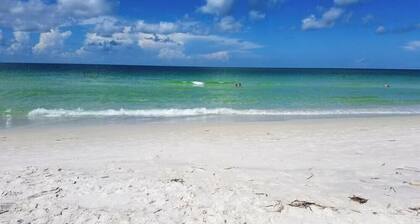 Steps to the Beach with Shared Heated Salt Pool and Private Backyard & Grill