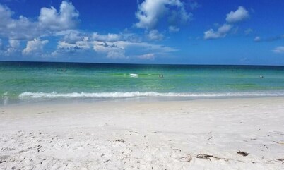 Steps to the Beach with Shared Heated Salt Pool and Private Backyard & Grill