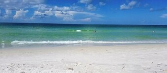Steps to the Beach with Shared Heated Salt Pool and Private Backyard & Grill