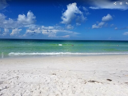 Steps to the Beach with Shared Heated Salt Pool and Private Backyard & Grill