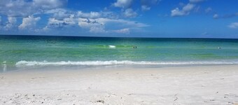 Steps to the Beach with Shared Heated Salt Pool and Private Backyard & Grill