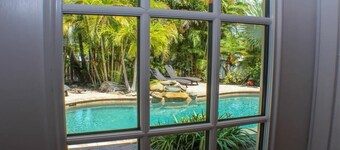 Steps to the Beach with Shared Heated Salt Pool and Private Backyard & Grill