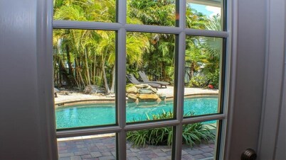 Steps to the Beach with Shared Heated Salt Pool and Private Backyard & Grill