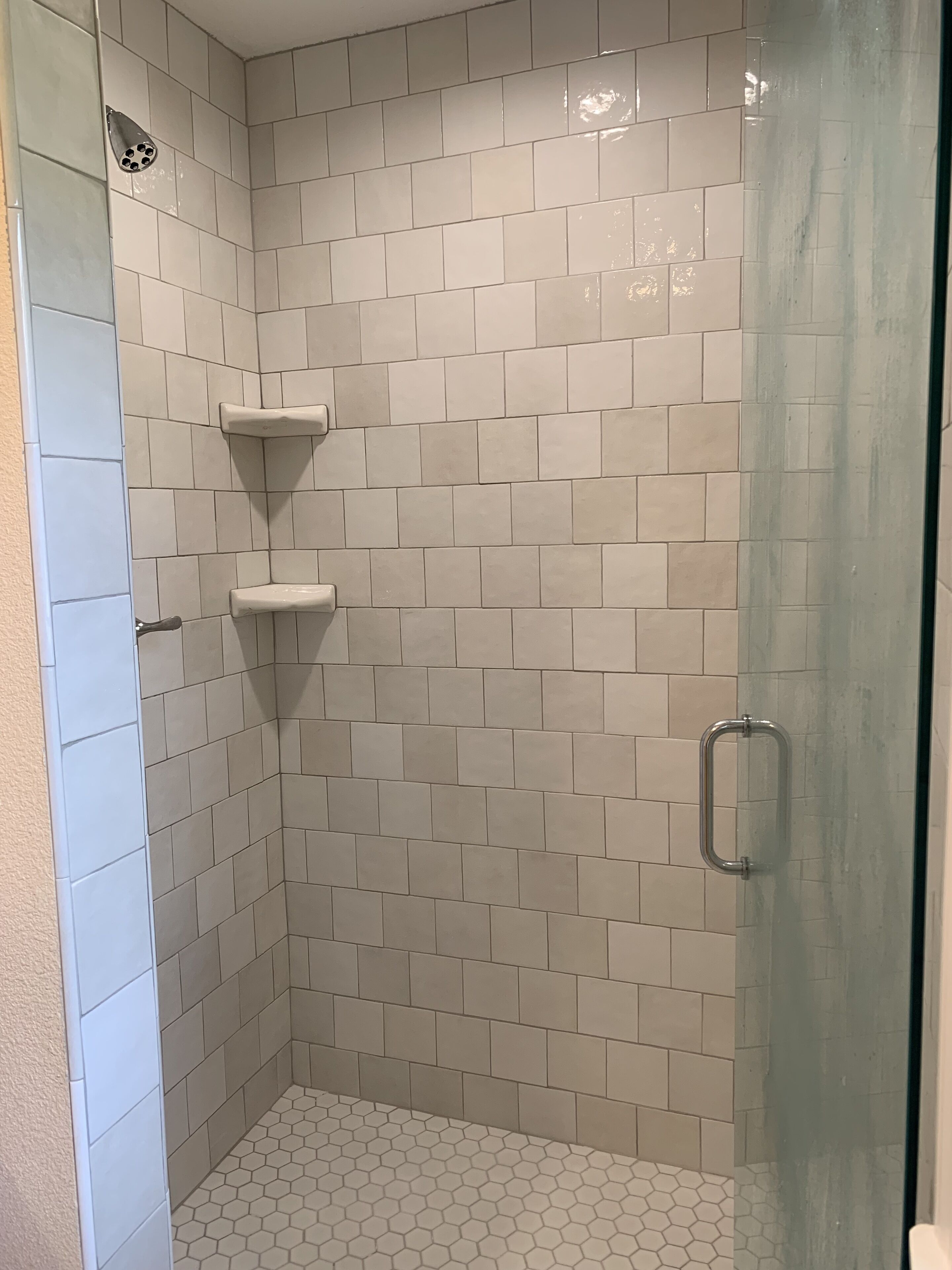 Combined shower/tub, hair dryer, towels, toilet paper