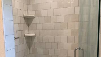 Combined shower/tub, hair dryer, towels, toilet paper
