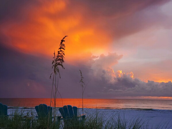 On the beach, sun-loungers, beach towels