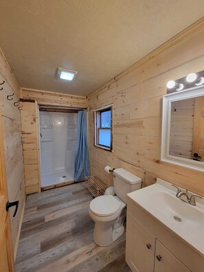 Shower, towels, toilet paper