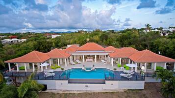 Outdoor pool, an infinity pool, sun loungers