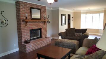 Smart TV, fireplace, books