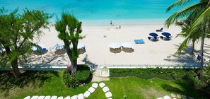 On the beach, sun-loungers