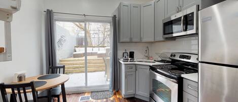 Drexel Duplex Private Yard and Deck garden | Private kitchen | Fridge, microwave, oven, stovetop