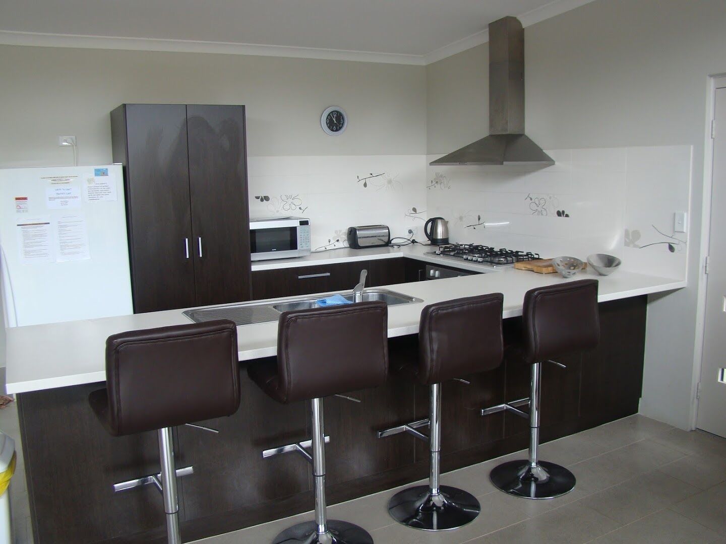 Microwave, dishwasher, high chair, cookware/dishes/utensils