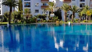 3 outdoor pools, pool umbrellas, pool loungers