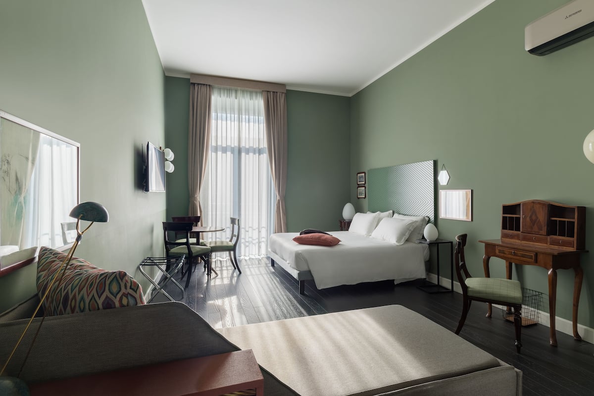 Deluxe Apartment, 1 Bedroom, Kitchen, City View | Premium bedding, down comforters, minibar, in-room safe