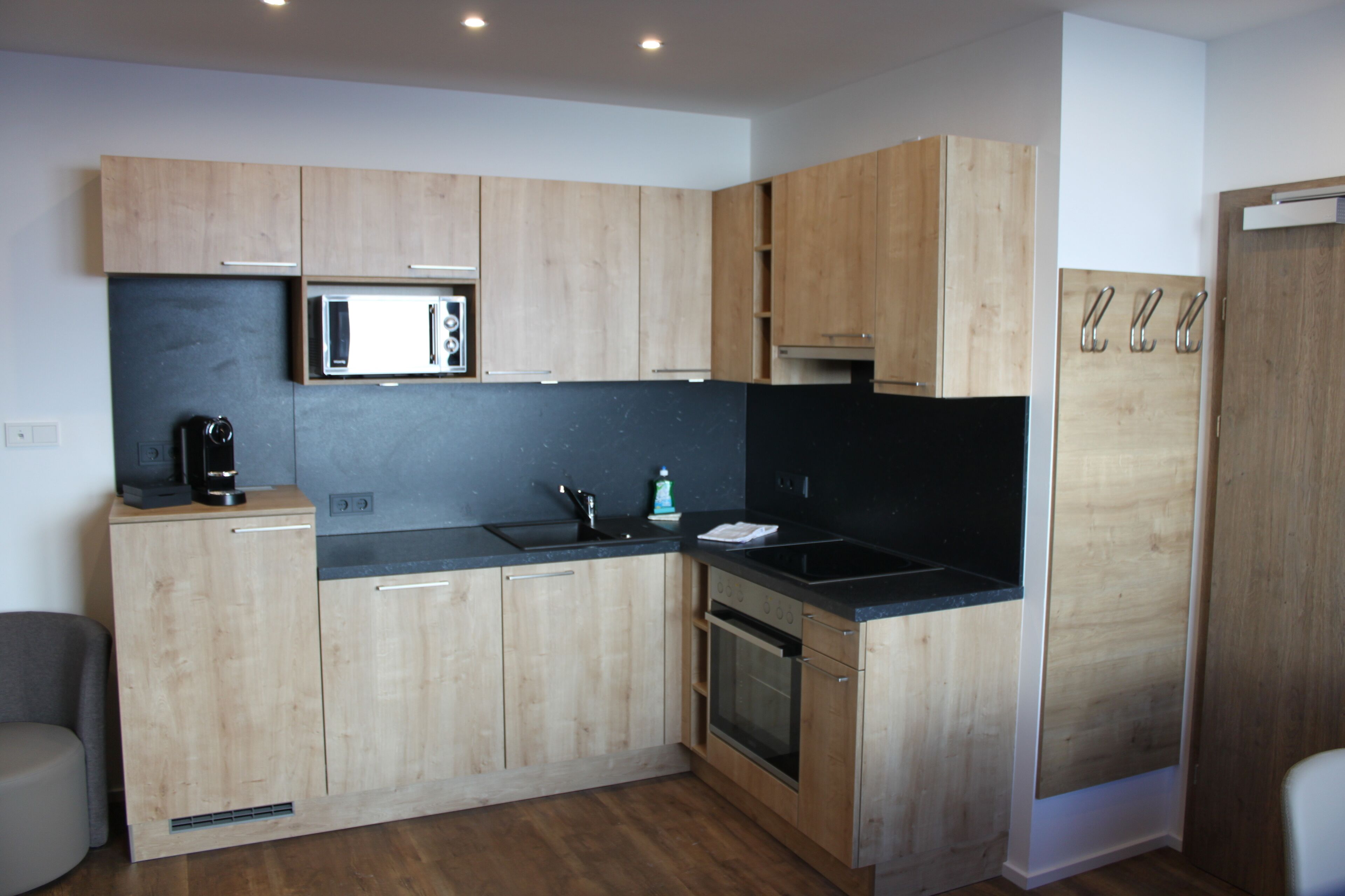 Dishwasher, coffee/tea maker, toaster, cookware/dishes/utensils