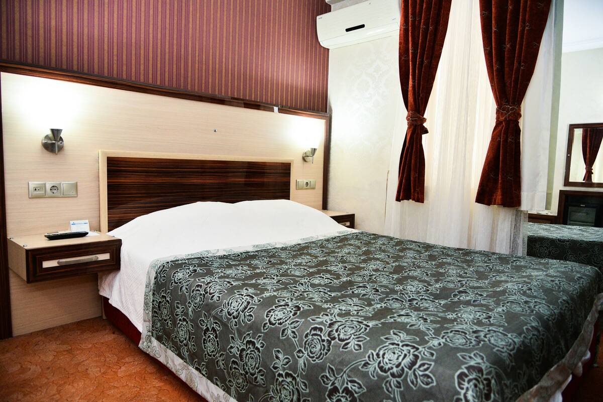 Economy Room | 1 bedroom, in-room safe, desk, WiFi (free)