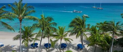 On the beach, sun loungers