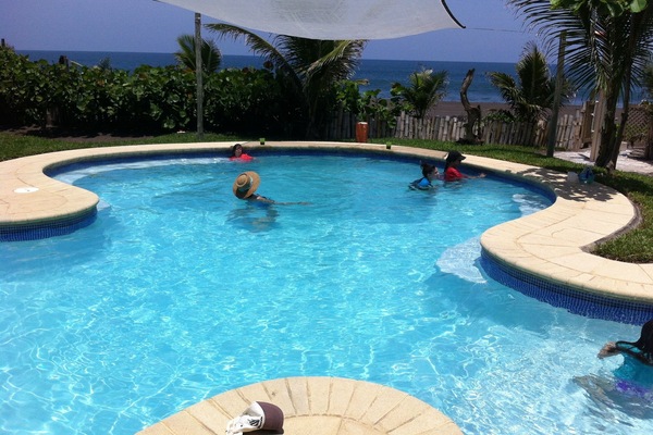 Enjoy the breeze and the view of the ocean from the pool...