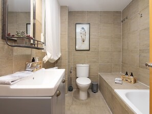 Hair dryer, towels, shampoo