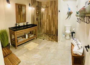 Combined shower/tub, hair dryer, towels, toilet paper