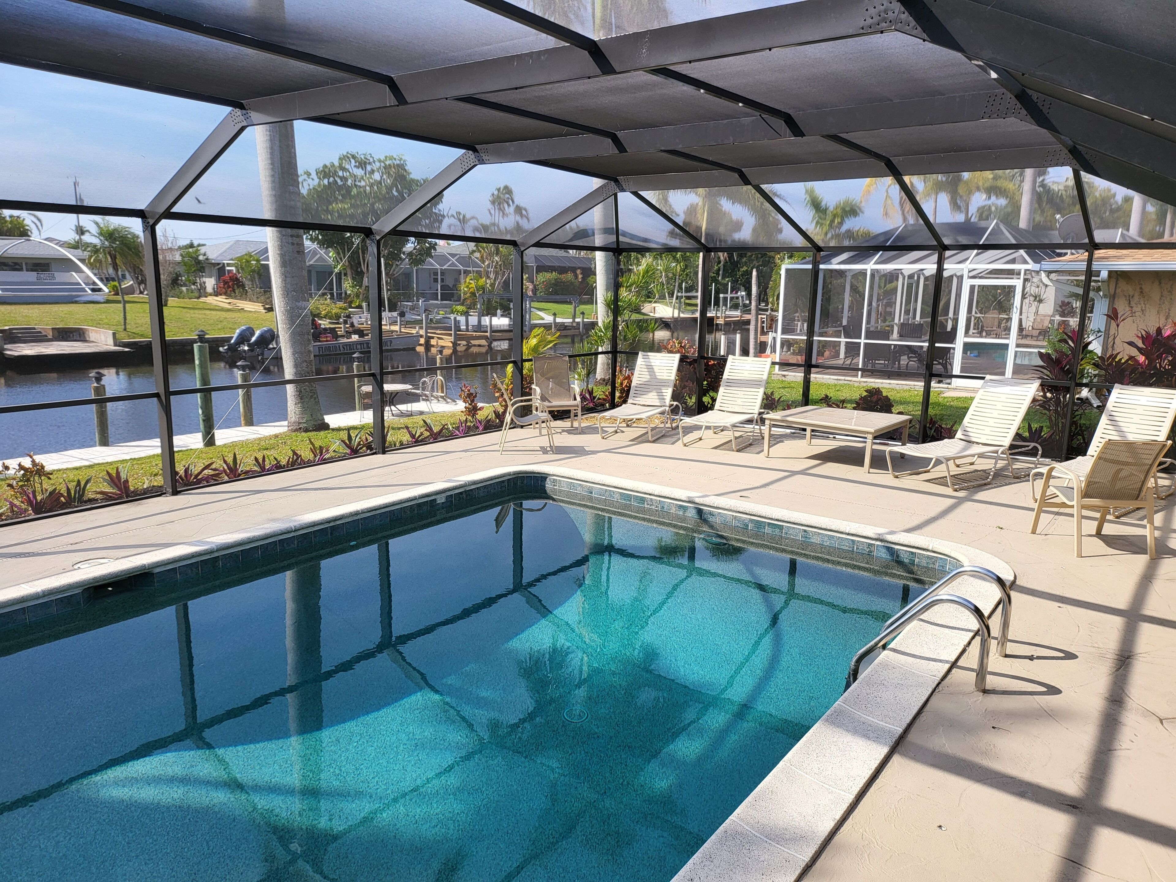 4 Bedroom 3 bath Canal, South facing Pool home,