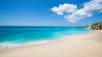 On the beach, sun-loungers, beach towels