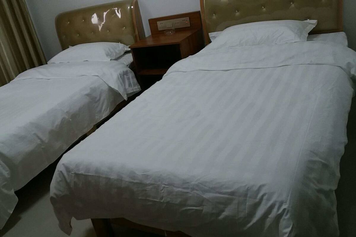 Desk, blackout curtains, free WiFi, bed sheets
