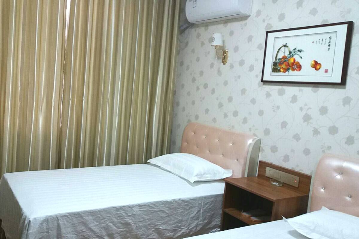 Desk, blackout curtains, free WiFi, bed sheets