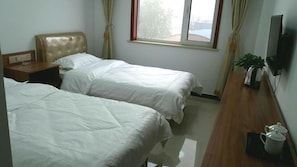Desk, blackout curtains, free WiFi, bed sheets - Xuhao Hotel (Shijiazhuang)