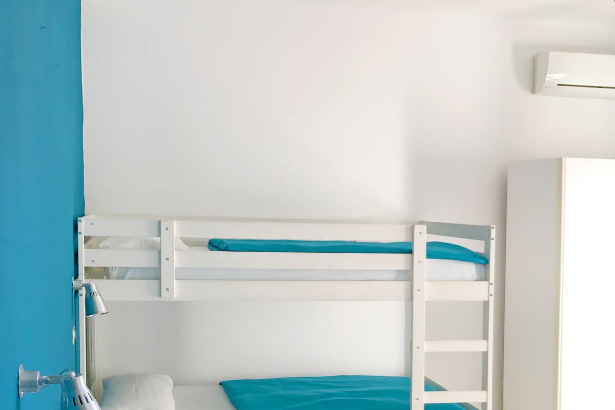 Quadruple Room, Multiple Beds, Non Smoking | In-room safe, WiFi (free), bed sheets