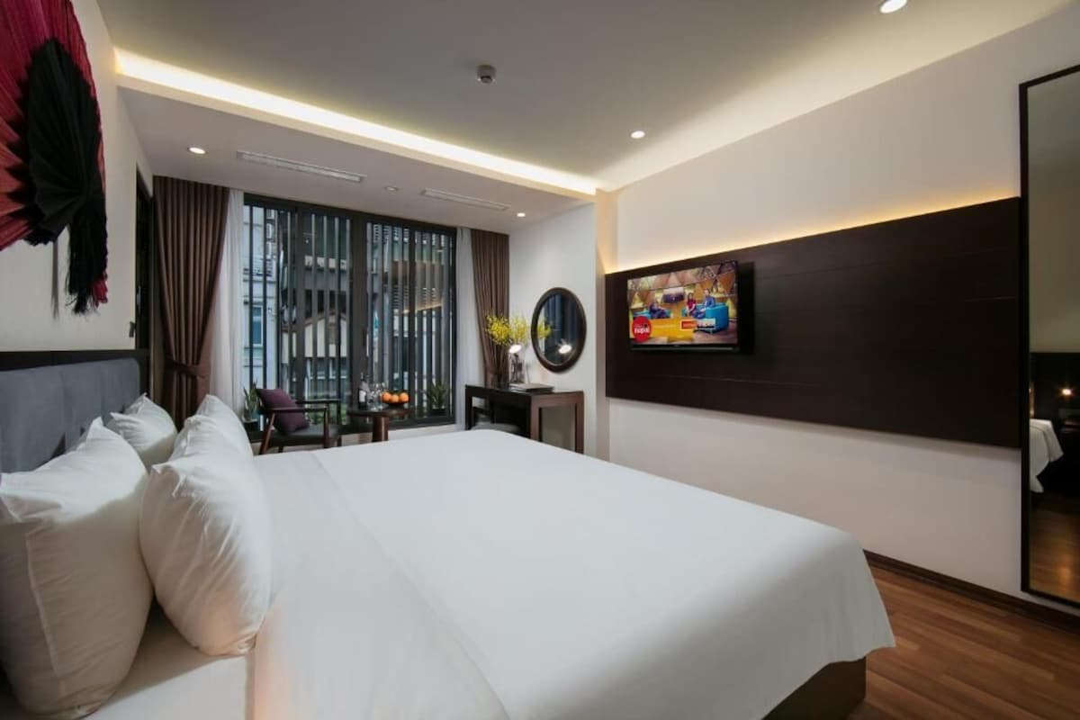 Literie de qualité supérieure, matelas mémoire de forme, minibar