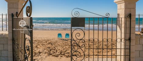 On the beach, sun loungers