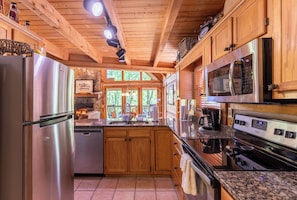 Coffee/tea maker, fridge, microwave, oven