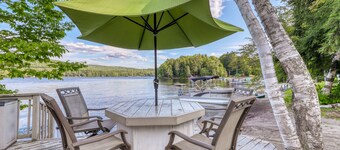 Peaceful lakefront house with private dock and sandy beach